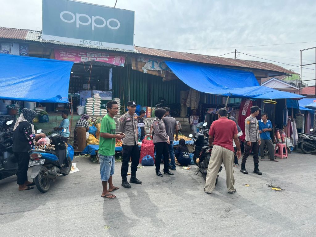 Demi Terciptanya Harkamtibmas, Polsek Koto VII Beri Imbauan Kamtibmas dan Patroli Jalan Kaki di Pasar Serikat Tanjung&nbsp;Ampalu