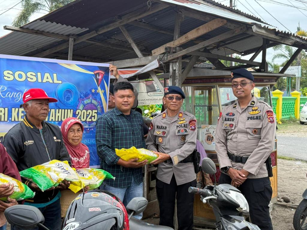 Brimob Polda Sumbar Bagikan 250 Kg Beras untuk Tukang Ojek dan Warga Kurang Mampu di Padang Sarai Rayakan HUT&nbsp;ke-80